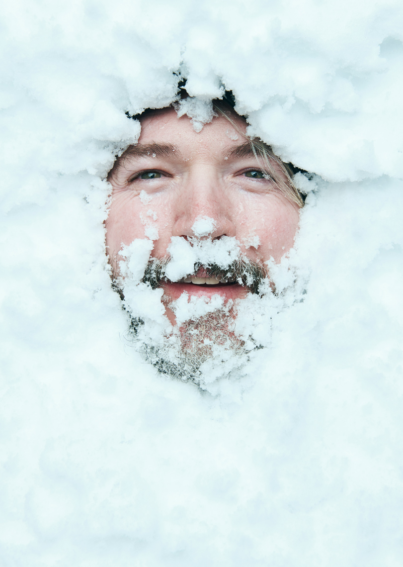 Man Buried in snow photo by Zach Kracht